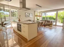 "TWO" - Premium Apartments Seekirchen, lichtdurchflutetes 3-Zimmer-Apartment mit Terrasse und grüner Oase