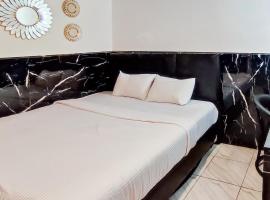 Urbanview Hotel Dream Guesthouse Padang，位于Kampungdurian的酒店