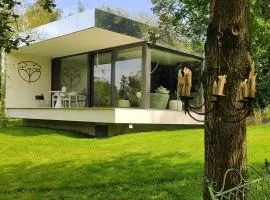 Logement insolite miroir dans la nature avec hottub et sauna