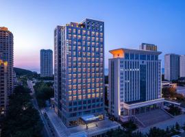 威海火炬八街戴斯温德姆酒店，位于威海的酒店