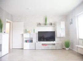 Ferienhaus mit Küche, Garten und Smart-TV