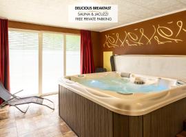 Guest House Hober，位于Prevalje的带停车场的酒店