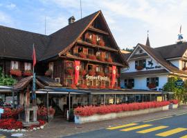Swiss-Chalet Merlischachen - Historik Chalet-Hotel Lodge，位于屈斯纳赫特的山林小屋