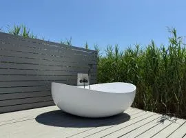 Seehütte Schilfhaus inklusive E-Boot am Neusiedler See