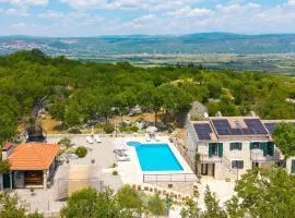 Villa Lugareva with 52 sqm private pool, 4 bedrooms, 4 bathrooms, summer kitchen, traditional environment, playground