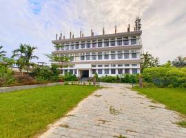 TAJ HERITAGE Hotel And Restaurant -call 94353-5O876，位于焦尔哈德的酒店