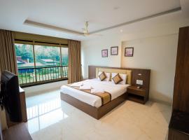 Adyar Plaza Inn by RAK Rooms, Mangaluru，位于门格洛尔门格洛尔国际机场 - IXE附近的酒店
