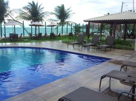 Praia Tabatinga AP Beira Mar com vista deslumbrante da praia，位于雅克南的酒店