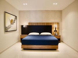 Suites Noche Tranquila-Fitness & Stay 101，位于库利亚坎的酒店