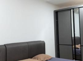 A Deluxe Room in Kundang Estates, Rawang，位于万挠的酒店