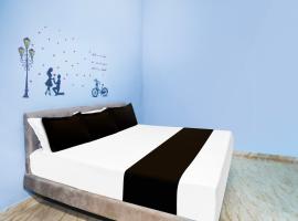 SPOT ON HOTEL RELAX INN，位于贾巴尔普尔的酒店