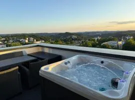 Penthouse mit Sauna, Jacuzzi & Tischkicker