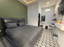 OYO 94668 Wisma 11 Oktober，位于帕朗卡拉亚的酒店