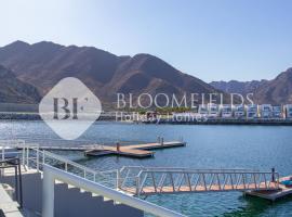 Bloomfields 4 Pluse Maid Royal Al Dana Villas，位于富查伊拉的酒店