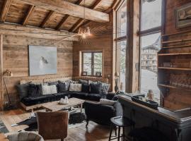 Chalet montagnard intime avec hammam à Val d'Isère - FR-1-844-19，位于瓦勒迪泽尔的酒店