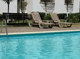 Appartement avec Piscine à Tamaris, Confort, Vue Jardin et Plages à Proximité