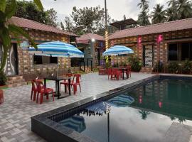 Daksh Holiday Home，位于阿利鲍格的酒店