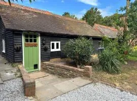 A charming cottage nestled in a peaceful woodland