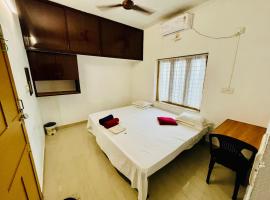 Red Rose Garden homestay Thrissur，位于德里久尔的酒店