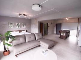 7月リフォームオープン!ナカマコンド恩納小学生まで添い寝無料，位于恩纳的酒店