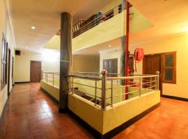 SPOT ON Mukkam Tourist Home，位于科泽科德的酒店