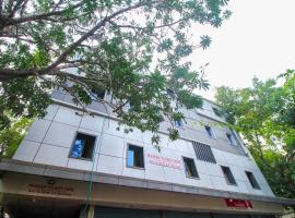 SPOT ON Mukkam Tourist Home，位于科泽科德的酒店