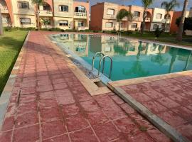 Duplex La roseraie à coté de la plage 2 piscines，位于希迪布济德的酒店