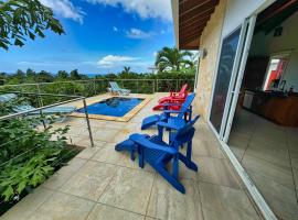 Spectacular Luxury Rental With Ocean Views And Private Pool，位于罗阿坦的酒店
