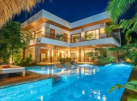 Villa Sima - Tropical Elegance in central Panglao，位于邦劳的自助式住宿