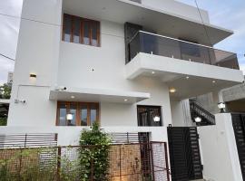 Hexahub Homestay and Hospitality Services，位于蒂鲁奇奇拉帕利的酒店