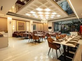 Tripli Hotels Evara Inn