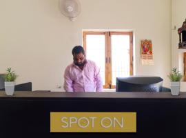 SPOT ON 42401 hotel Divine farm，位于阿里格尔的酒店