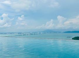 Sky Pool Luxury Stay Sea View Bayan Airport，位于峇六拜的酒店