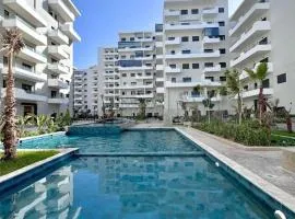 Duplex Luxe Vue Mer & Piscine à Zenata Eco City