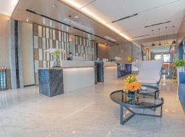 Echarm Hotel Zigong Machishui Wanda Plaza，位于自贡的酒店