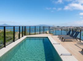 The Bridge by Xtay - Estúdio completo com Wi-Fi rápido, piscina e academia, no Centro，位于弗洛里亚诺波利斯的酒店