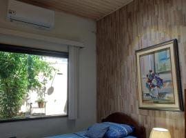 Quarto em casa familiar.