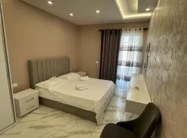 Palm View Luxury Apartment Golem