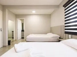 Lou Suítes - Suíte 9 com 2 camas de casal - total confort