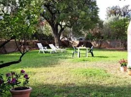 L'oasi - Monolocale con giardino in Sardegna