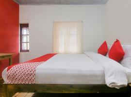 Hotel O Bell's Bigxa Homestay，位于乞拉朋齐的酒店