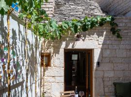 Dimore Piazza Roma Trulli & Suite，位于阿尔贝罗贝洛的酒店