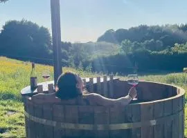 Glamping with outdoor wood-fired hot tub