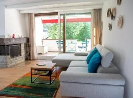 Apartment with fireplace, pool, and sauna