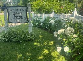 威利斯顿乡村旅馆，位于伯灵顿的带停车场的酒店