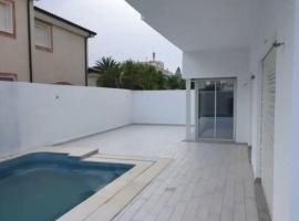 Etage de villa avec piscine privée à Kantaoui Méditerranée，位于哈曼苏斯的酒店