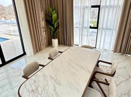 Dirat Al-Ghizal 1，位于拉斯阿尔卡麦的酒店