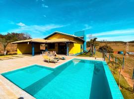 Rancho Ipê Amarelo - Capitólio - MG，位于瓜佩的酒店