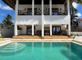 Amani Beach Villa- Bwejuu，位于布韦朱的酒店
