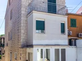 Stone house with two balconies and the sea view